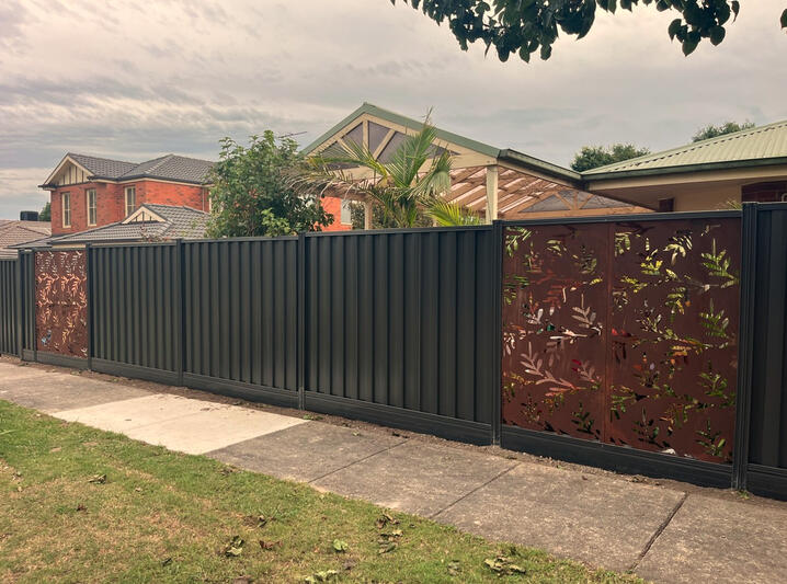 Premium Colorbond Fence Installation in Beaconsfield premium Colorbond fence with decorative panels and aluminium sleepers installed in Beaconsfield